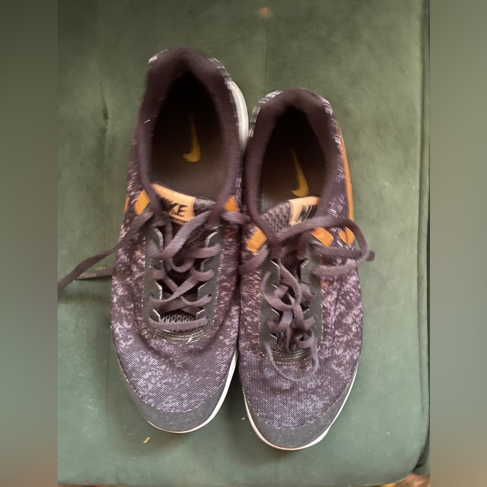 Black and golds Nike sneakers